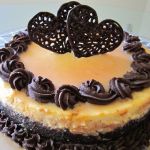 Vanilla Cheesecake with Caramel and Chocolate Ganache