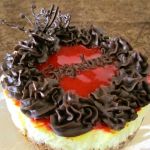 Citrus Cheesecake with Raspberry Coulis & Chocolate Ganache