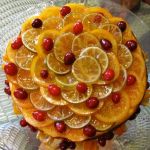 Vanilla Cheesecake with Candied Oranges, Limes, & Cranberries